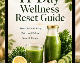 May include: A digital tablet displays a wellness guide titled "14-Day Wellness Reset Guide." The image features a green smoothie in a glass and bottle, with lemon slices, ginger, and cucumber. The guide promises to revitalize, detox, and nourish.