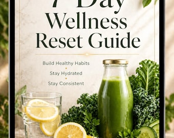 May include: Digital tablet displaying a wellness guide. The screen shows the text "7-Day Wellness Reset Guide" with supporting text. A glass of water with lemon slices, a green smoothie, and fresh produce are also visible.