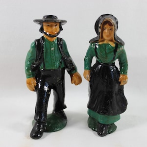 Vintage Cast Iron Amish Couple Man Woman