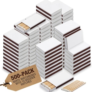May include: A 500-pack of white matchboxes with brown strike strips, each containing 18 wooden matches with white tips. A brown cardboard tag is attached, printed with the text: 500-PACK WHITE MATCHBOXES WITH 18 WOODEN MATCHES.