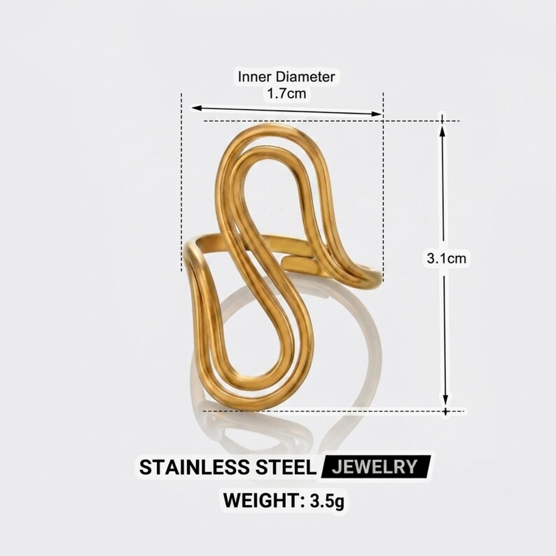 May include: A gold-colored stainless steel ring with an open, wavy, abstract wire design. The ring has an inner diameter of 1.7 cm and a total height of 3.1 cm. The text STAINLESS STEEL JEWELRY and WEIGHT: 3.5g is printed below the ring.