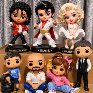 May include: A collection of seven stylised vinyl figures featuring Michael Jackson, Elvis Presley, and Marilyn Monroe on black circular bases, alongside four smaller figures including a person in a blue shirt with tyres and a person holding a gold bar.