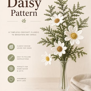 May include: A crochet pattern titled "Daisy Pattern" featuring a bouquet of handmade white and yellow daisy flowers in a glass vase. The image includes text that reads "A timeless crochet classic to brighten any space."