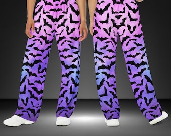 Pantalones unisex de pierna ancha con estampado integral de murciélagos de galaxia arcoíris.