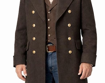 May include: A dark brown wool duster coat featuring a double-breasted front with gold-toned buttons, a contrasting velvet collar, a brown vest, a patterned neckerchief, blue denim jeans, a brown leather belt, and a matching dark brown cowboy hat.