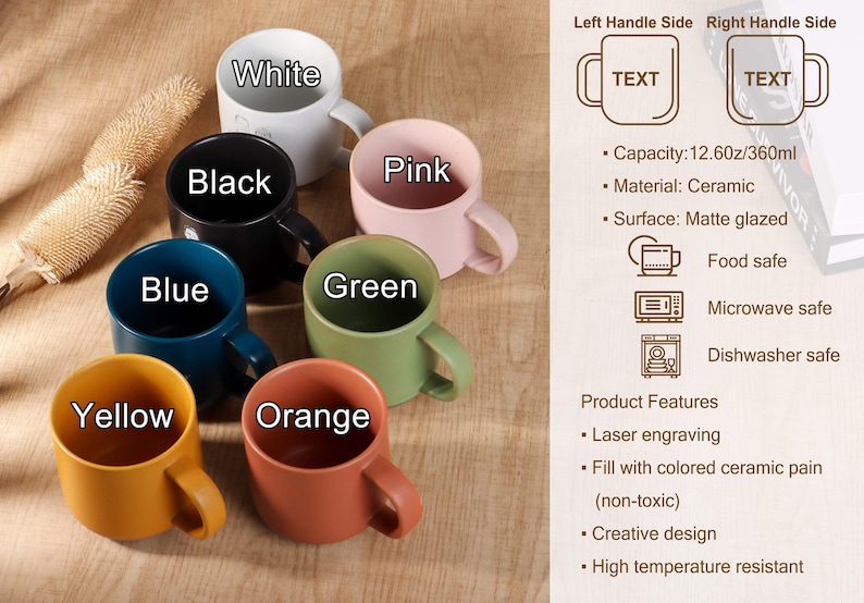 May include: A collection of ceramic mugs in various colors: white, black, blue, yellow, orange, green, and pink. Each mug has a handle and is labeled with its color. The mugs are food, microwave, and dishwasher safe.