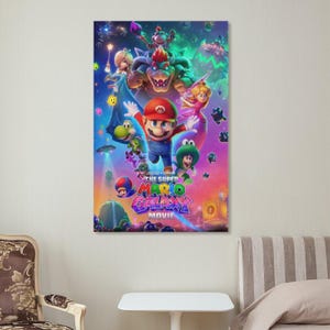 May include: A colorful movie poster for "The Super Mario Galaxy Movie" featuring Mario, Bowser, Princess Peach, and other characters. The poster has a vibrant, space-themed background with the movie title prominently displayed.