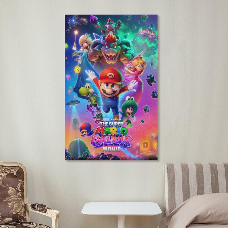 May include: A colorful movie poster for "The Super Mario Galaxy Movie" featuring Mario, Bowser, Princess Peach, and other characters. The poster has a vibrant, space-themed background with the movie title prominently displayed.