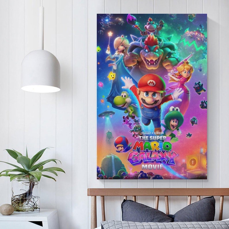 May include: A vibrant poster for "The Super Mario Galaxy Movie" featuring Mario, Bowser, Princess Peach, and other characters. The artwork has a colorful, space-themed background with the movie title prominently displayed.