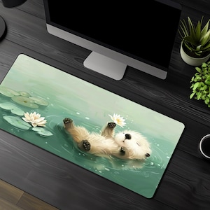 May include: A white ceramic mug with a black handle and the text "But First, Coffee" in a bold, black font. The mug is set against a blurred background, suggesting a cozy setting.