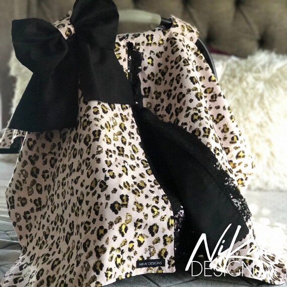 cheetah print baby carrier