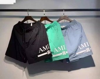 Bañador corto verde con logo MA para hombre de AMIRI - Trajes de baño de lujo de diseñador