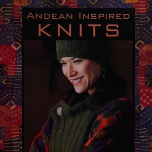 May include: A book titled Andean Inspired Knits: Designs in Luxurious Alpaca by Helen Hamann. The cover features a person wearing a green knit hat and a multi-colored patterned sweater with red, purple, and orange tones against a dark background.
