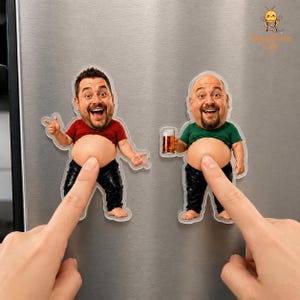 May include: Two custom photo magnets featuring caricatures of men with exposed bellies. One figure wears a red shirt, the other a green shirt and holds a beer mug. Both have dark hair, facial hair, and black pants. The magnets are die-cut shapes.