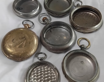 Empty old pocket watch case's for parts or repurpose. Assorted sizes.