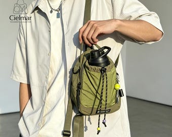 Mini bolso bandolera de nailon, mochila de senderismo, bolso bandolera para botella de agua, estuche ligero para teléfono, ideal para ciclismo, camping y deportes al aire libre.