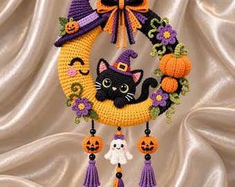 May include: A crocheted Halloween wreath featuring a yellow crescent moon with a smiling face, a black cat wearing a purple witch hat, orange pumpkins, purple flowers, and a hanging mobile with two jack-o'-lanterns and a white ghost with tassels.