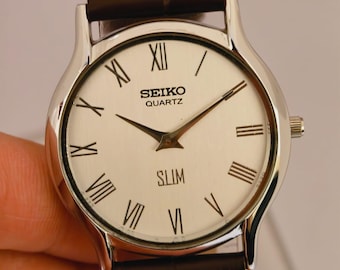 Reloj Seiko Slim Tank de cuarzo vintage – esfera blanca con números romanos – Restaurado – Reloj clásico unisex