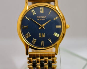 Reloj Seiko Slim Tank de cuarzo vintage – esfera azul con números romanos – Restaurado – Reloj de vestir clásico unisex