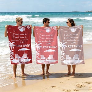 May include: Three beach towels in red, pink, and tan, each with the text "I don't want to, I don't have to, you can't make me, I'M RETIRED." The towels feature a beach scene with palm trees, chairs, and an umbrella.