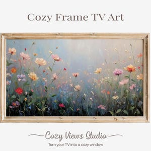 May include: A trio of cream-glazed ceramic mugs, each adorned with a hand-painted floral pattern in blue, green, and yellow hues. The mugs have a rounded form and a handle, perfect for tea or coffee.