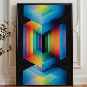 May include: Geometric abstract art print in a black frame. The artwork features a vibrant, colorful design with a spectrum of colors including blue, yellow, orange, and green. The design has a three-dimensional appearance with geometric shapes.