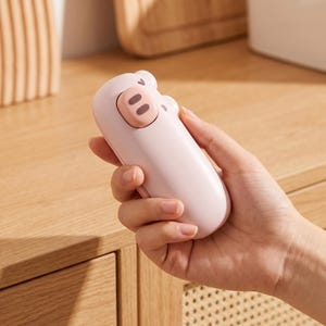 Mini selladora de bolsas, selladora térmica portátil para almacenamiento de alimentos, utensilio de cocina con diseño de cerdito