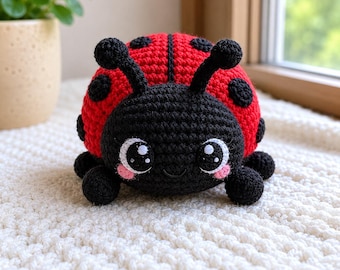 May include: A handmade crochet ladybug toy. The ladybug has a red body with black spots, a black head, and black antennae. The eyes are white with black pupils and pink cheeks. The toy is sitting on a white, textured surface.
