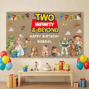 May include: A large rectangular birthday banner featuring Toy Story characters including Rex, Bo Peep, Woody, Slinky Dog, Hamm, Mr. Potato Head, Buzz Lightyear, Bullseye, and Jessie. The text reads TWO INFINITY & BEYOND HAPPY BIRTHDAY GABRIEL.