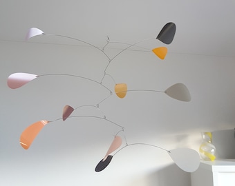 Pastel kinetic mobile, calming home decor, pink orange grey, handmade from recycled plastic bottles by Becky Crawford from Spacefruit