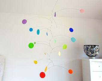 Rainbow kinetic mobile handmade from upcycled plastic bottles by Becky Crawford from Spacefruit, sustainable interior decor, eco design..