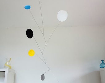 Modern geometric kinetic mobile, made by hand from recycled plastic by Becky Crawford from Spacefruit
