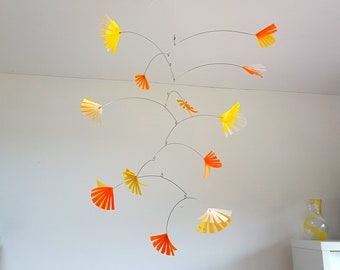 Yellow orange mobile for nursery or playroom, kinetic mobile handmade from recycled plastic bottles by Becky Crawford from Spacefruit