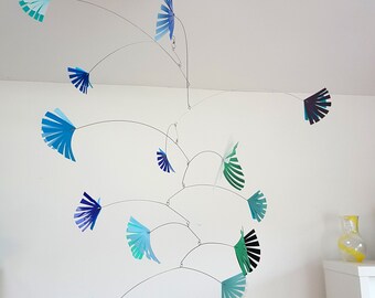 Kinetic mobile for nursery or living room in blues and greens. Handmade from recycled plastic bottles for your eco home by Becky Crawford