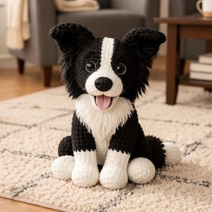 May include: A black and white crochet dog, crafted to look like a Border Collie. The soft toy has white accents on its chest, paws, and head. The dog is positioned on a patterned rug, with its tongue visible.