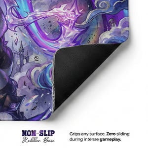 May include: A non-slip mousepad with a colorful fantasy art design in shades of purple, blue, and silver. The mousepad has a black rubber base and features the text "NON-SLIP Rubber Base". The mousepad is designed for intense gameplay.