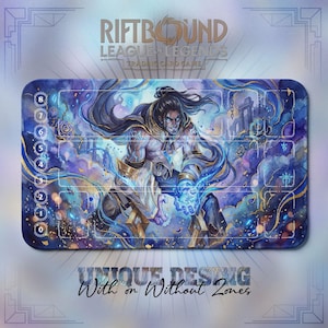 May include: A rectangular Riftbound League of Legends trading card game playmat. The mat features a watercolor illustration of a male character with blue energy effects. The mat has zones marked with numbers and the text "UNIQUE DESIGN With or Without Zones".