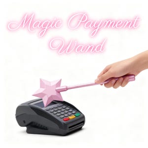 May include: A pink star-shaped magic wand rests on a black payment terminal. The wand has a long handle, and the text "Magic Payment Wand" is written in pink cursive above the wand.