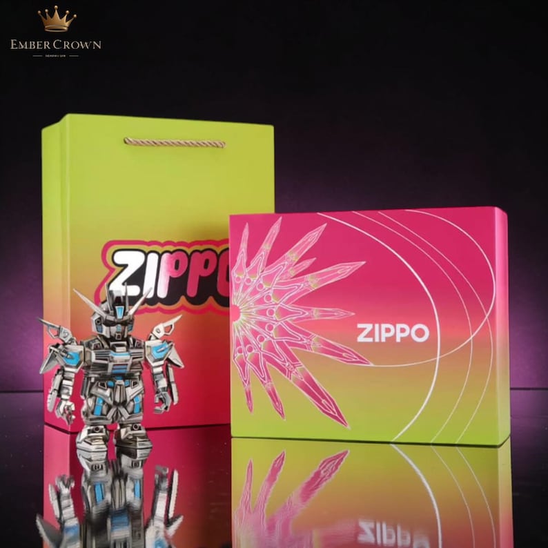 May include: A metallic robot figure stands before a gift bag and box, both featuring the "Zippo" logo. The gift bag is lime green with the logo in pink and white. The box is pink and yellow with a starburst design and the Zippo logo.