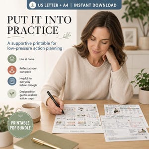 A woman with dark hair is seated at a wooden table, writing on a CBT Action Planner worksheet, with other planner pages and a pen nearby.