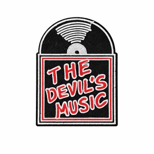 May include: A black patch with a red and white border featuring the text "THE DEVIL'S MUSIC" in red, stylized lettering. Above the text is a black circle with a white graphic resembling a record.