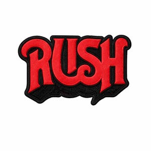 May include: A red embroidered patch featuring the word "RUSH" in a bold, stylized font. The text has a black border. The patch is likely for a band or music-related merchandise, suitable for clothing or accessories.