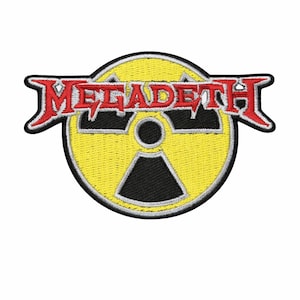 May include: Embroidered patch featuring the word "MEGADETH" in red, stylized lettering above a yellow circle with a black radiation symbol. The patch has a black border and is designed for application on clothing or accessories.