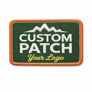 May include: A rectangular custom patch with a green background and white embroidered text that reads "CUSTOM PATCH Your Logo". The patch has a white mountain range design and an orange border.