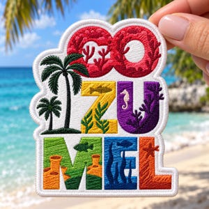 May include: An embroidered patch featuring the word COZUMEL in large, colorful letters. The letters are decorated with tropical imagery including palm trees, coral, fish, a seahorse, and a starfish. The patch has a white border and white background.
