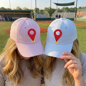 Map Pin Graphic Embroidered Hat, Location Marker Baseball Cap, Minimalist Travel Lover Gift, Vibrant Yellow and Pink Summer Headwear.