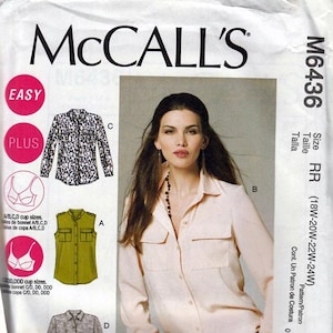 May include: McCall's M6436 sewing pattern envelope for sizes 18W-24W. The front displays a light peach long-sleeve button-down shirt, with smaller illustrations of a leopard print shirt, a sleeveless olive green shirt, and a gray patterned shirt.