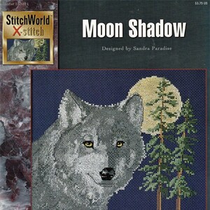 May include: Cross-stitch pattern for a wolf howling at the moon. The pattern is called "Moon Shadow" and was designed by Sandra Paradise. The pattern is 10 inches by 10 inches and uses 14 count Aida fabric.