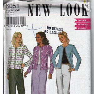 May include: A sewing pattern for a jacket and pants. The pattern is for sizes 10-22. The pattern is from New Look and has instructions in English, French, and Spanish. The pattern shows three different models wearing the jacket and pants. The jacket is shown in three different colors: purple, blue, and green. The pants are shown in two different colors: white and green.