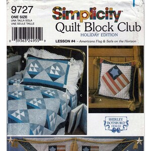 May include: A Simplicity Quilt Block Club pattern for a holiday edition quilt. The pattern is for lesson #4, Americana Flag & Sails on the Horizon. The pattern includes instructions for making a quilt with a red, white, and blue American flag design.